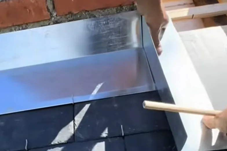 Remplacement de gouttières zinc